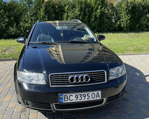 Черный Ауди А4, объемом двигателя 2.01 л и пробегом 275 тыс. км за 5300 $, фото 1 на Automoto.ua