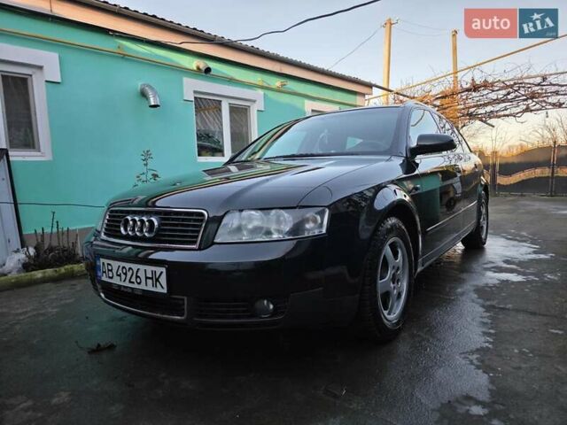 Черный Ауди А4, объемом двигателя 2 л и пробегом 220 тыс. км за 5000 $, фото 1 на Automoto.ua