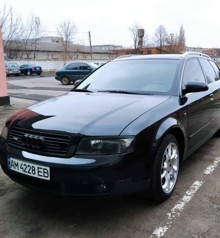 Черный Ауди А4, объемом двигателя 1.6 л и пробегом 326 тыс. км за 4900 $, фото 1 на Automoto.ua