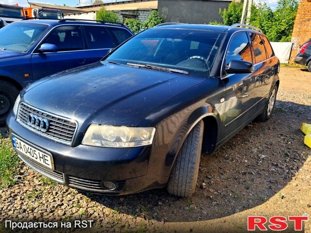 Черный Ауди А4, объемом двигателя 2 л и пробегом 300 тыс. км за 4900 $, фото 1 на Automoto.ua