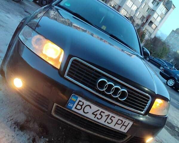 Черный Ауди А4, объемом двигателя 1.8 л и пробегом 274 тыс. км за 5750 $, фото 1 на Automoto.ua