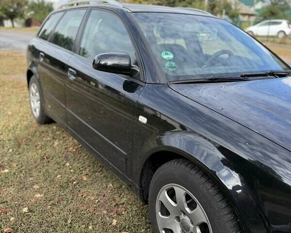 Черный Ауди А4, объемом двигателя 1.6 л и пробегом 200 тыс. км за 5600 $, фото 1 на Automoto.ua