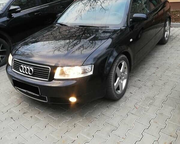 Черный Ауди А4, объемом двигателя 1.98 л и пробегом 240 тыс. км за 3900 $, фото 1 на Automoto.ua