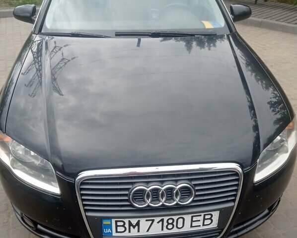 Черный Ауди А4, объемом двигателя 2 л и пробегом 330 тыс. км за 6300 $, фото 1 на Automoto.ua