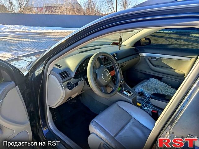 Черный Ауди А4, объемом двигателя 2 л и пробегом 400 тыс. км за 7500 $, фото 1 на Automoto.ua