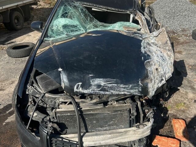 Черный Ауди А4, объемом двигателя 2 л и пробегом 300 тыс. км за 1400 $, фото 1 на Automoto.ua