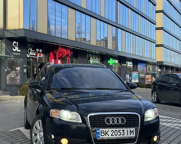Чорний Ауді А4, об'ємом двигуна 2 л та пробігом 353 тис. км за 6199 $, фото 1 на Automoto.ua
