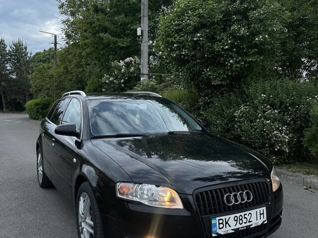 Черный Ауди А4, объемом двигателя 2 л и пробегом 300 тыс. км за 5999 $, фото 1 на Automoto.ua