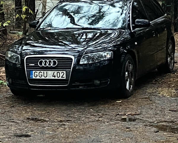 Черный Ауди А4, объемом двигателя 2 л и пробегом 290 тыс. км за 3700 $, фото 1 на Automoto.ua