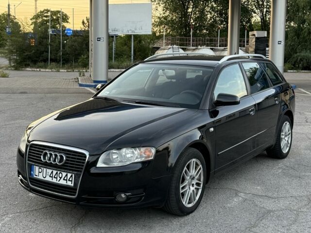 Черный Ауди А4, объемом двигателя 2 л и пробегом 300 тыс. км за 3500 $, фото 1 на Automoto.ua