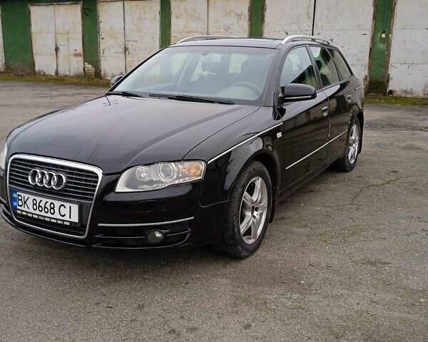 Черный Ауди А4, объемом двигателя 2 л и пробегом 266 тыс. км за 7000 $, фото 1 на Automoto.ua