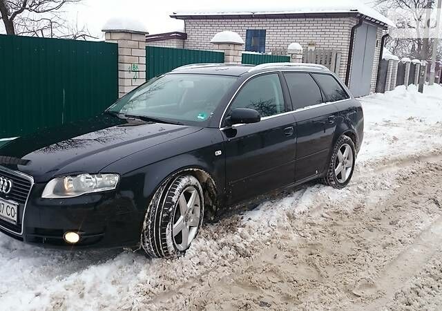 Чорний Ауді А4, об'ємом двигуна 2 л та пробігом 215 тис. км за 11800 $, фото 1 на Automoto.ua