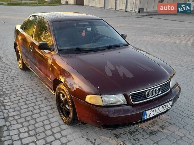 Красный Ауди А4, объемом двигателя 1.6 л и пробегом 280 тыс. км за 1400 $, фото 1 на Automoto.ua