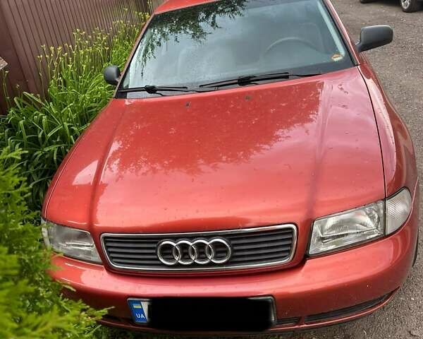 Красный Ауди А4, объемом двигателя 1.6 л и пробегом 200 тыс. км за 5100 $, фото 1 на Automoto.ua