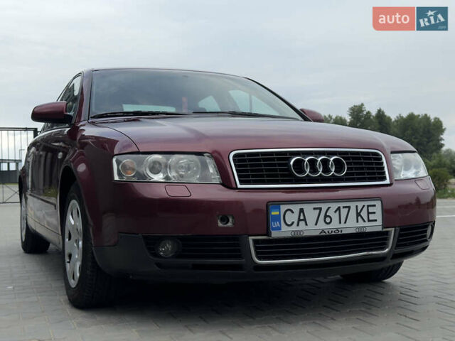 Красный Ауди А4, объемом двигателя 1.98 л и пробегом 251 тыс. км за 4600 $, фото 1 на Automoto.ua