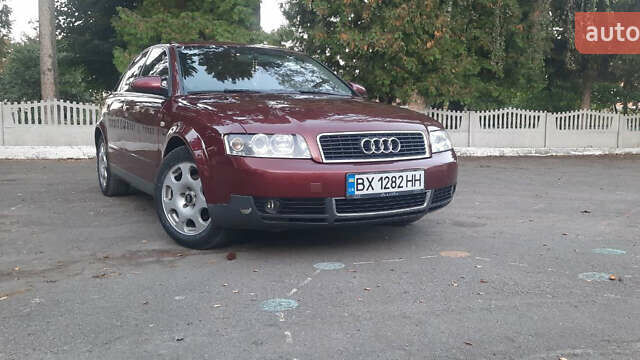 Красный Ауди А4, объемом двигателя 1.6 л и пробегом 300 тыс. км за 4900 $, фото 1 на Automoto.ua