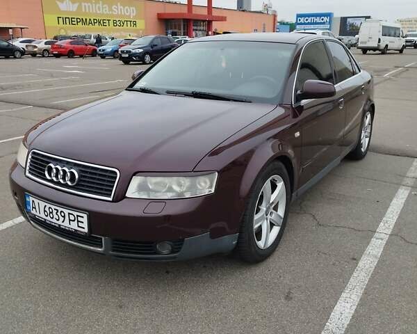Красный Ауди А4, объемом двигателя 3 л и пробегом 267 тыс. км за 5900 $, фото 1 на Automoto.ua