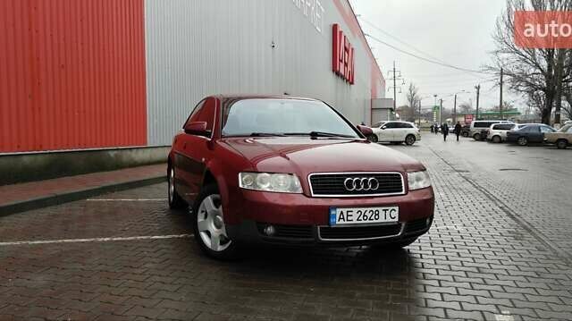 Красный Ауди А4, объемом двигателя 1.78 л и пробегом 240 тыс. км за 5850 $, фото 1 на Automoto.ua