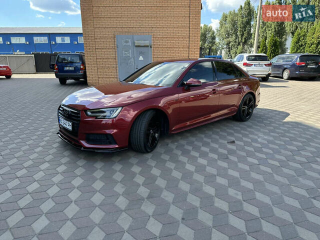 Красный Ауди А4, объемом двигателя 1.98 л и пробегом 100 тыс. км за 22400 $, фото 1 на Automoto.ua