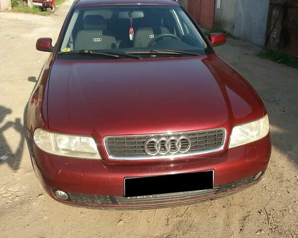 Красный Ауди А4, объемом двигателя 1.9 л и пробегом 320 тыс. км за 4600 $, фото 1 на Automoto.ua