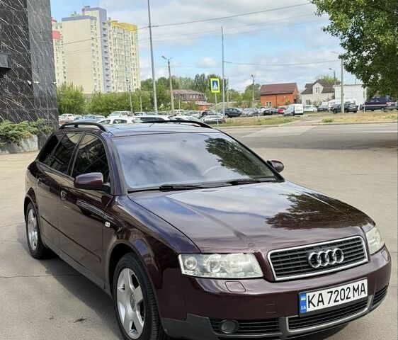 Красный Ауди А4, объемом двигателя 2.5 л и пробегом 397 тыс. км за 5000 $, фото 1 на Automoto.ua