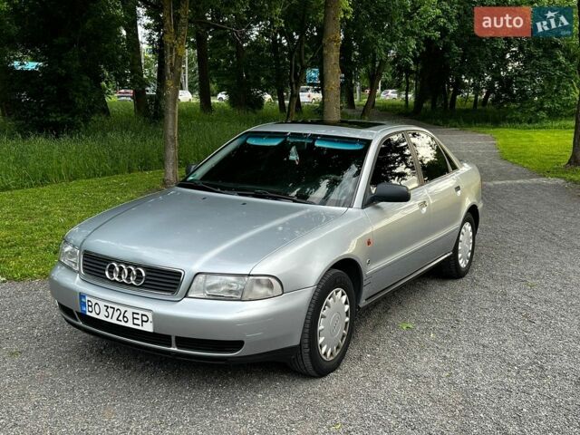Сірий Ауді А4, об'ємом двигуна 1.6 л та пробігом 244 тис. км за 3599 $, фото 1 на Automoto.ua