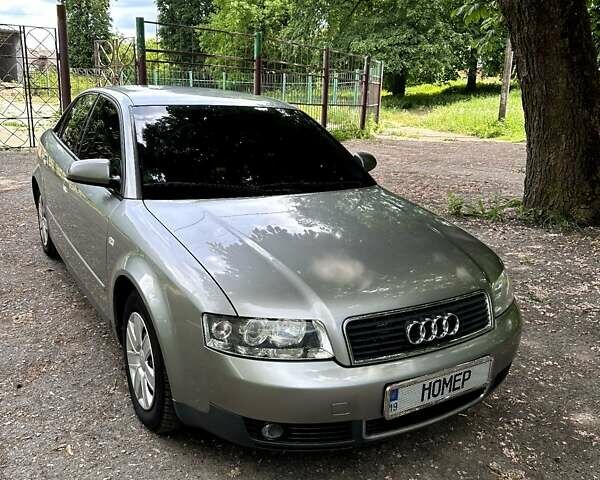Сірий Ауді А4, об'ємом двигуна 1.6 л та пробігом 220 тис. км за 4900 $, фото 1 на Automoto.ua