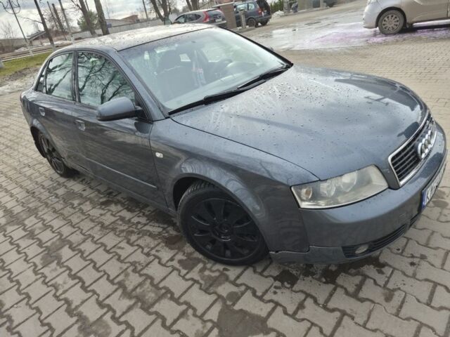 Серый Ауди А4, объемом двигателя 2 л и пробегом 322 тыс. км за 2200 $, фото 1 на Automoto.ua