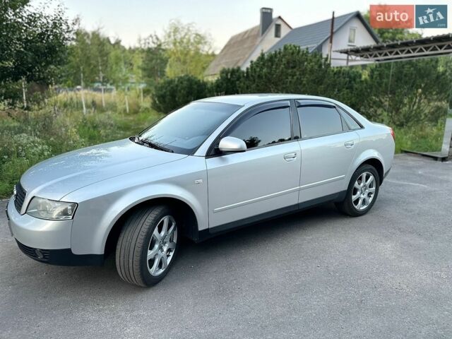 Серый Ауди А4, объемом двигателя 2 л и пробегом 246 тыс. км за 5800 $, фото 1 на Automoto.ua