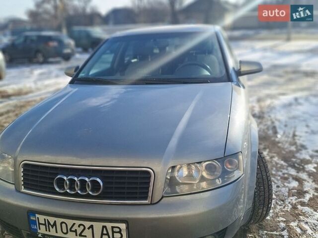 Серый Ауди А4, объемом двигателя 2 л и пробегом 396 тыс. км за 3500 $, фото 1 на Automoto.ua