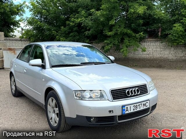 Серый Ауди А4, объемом двигателя 2 л и пробегом 199 тыс. км за 4100 $, фото 1 на Automoto.ua