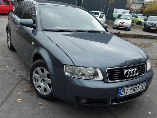 Серый Ауди А4, объемом двигателя 2 л и пробегом 290 тыс. км за 4200 $, фото 1 на Automoto.ua