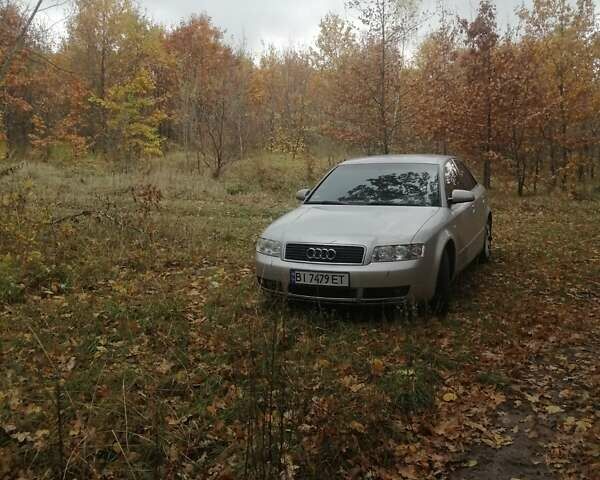 Серый Ауди А4, объемом двигателя 1.6 л и пробегом 260 тыс. км за 5000 $, фото 1 на Automoto.ua