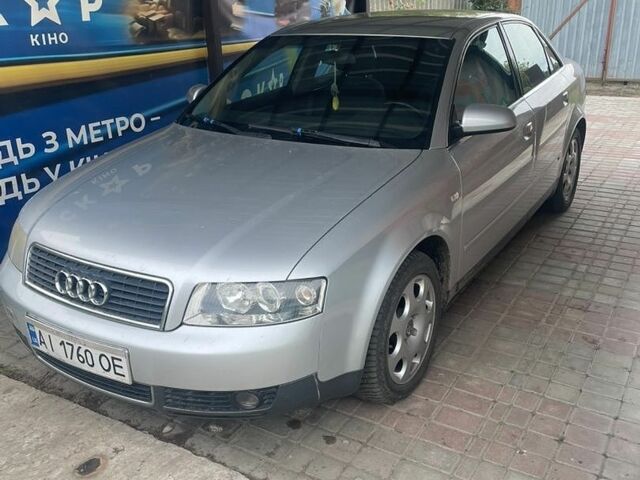 Серый Ауди А4, объемом двигателя 2 л и пробегом 350 тыс. км за 4200 $, фото 1 на Automoto.ua