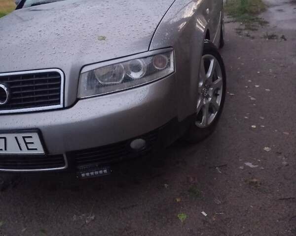 Серый Ауди А4, объемом двигателя 1.6 л и пробегом 246 тыс. км за 5200 $, фото 1 на Automoto.ua