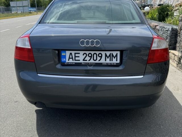 Серый Ауди А4, объемом двигателя 2 л и пробегом 244 тыс. км за 5900 $, фото 1 на Automoto.ua