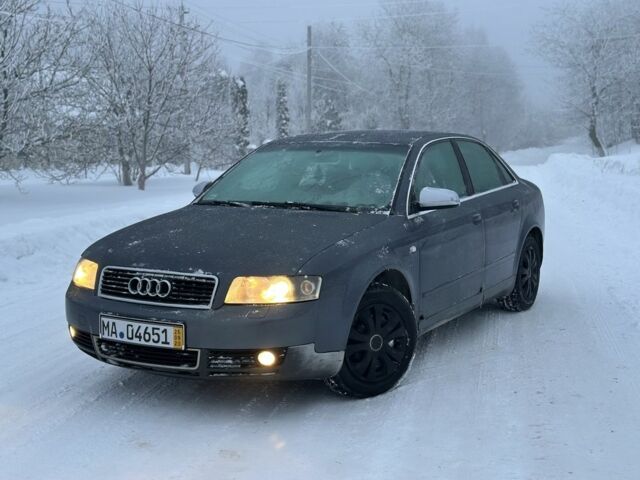 Серый Ауди А4, объемом двигателя 2 л и пробегом 250 тыс. км за 1799 $, фото 1 на Automoto.ua