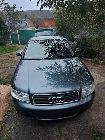 Серый Ауди А4, объемом двигателя 2 л и пробегом 250 тыс. км за 2500 $, фото 1 на Automoto.ua