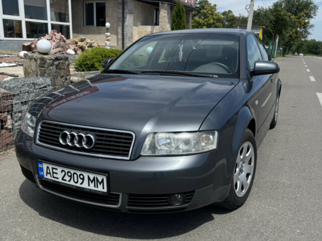Серый Ауди А4, объемом двигателя 2 л и пробегом 244 тыс. км за 5900 $, фото 1 на Automoto.ua