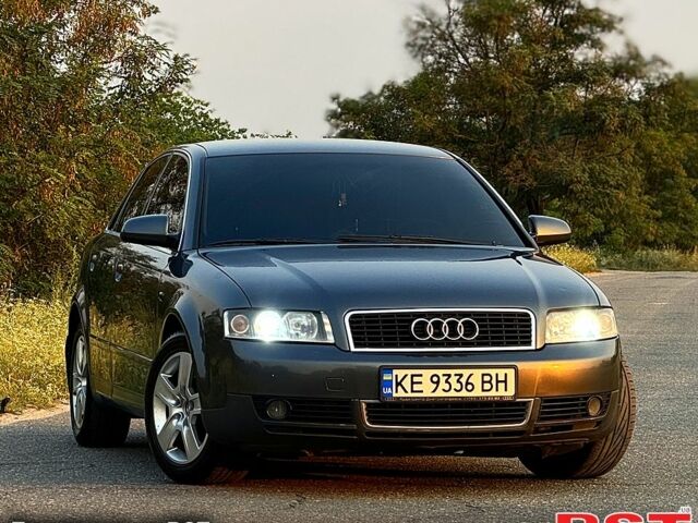 Серый Ауди А4, объемом двигателя 2 л и пробегом 275 тыс. км за 5500 $, фото 1 на Automoto.ua