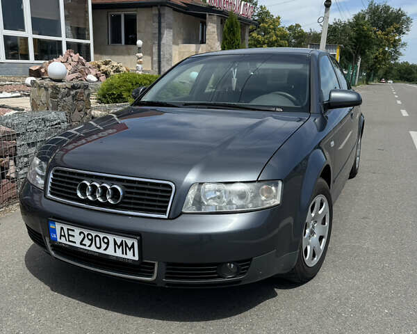 Сірий Ауді А4, об'ємом двигуна 2 л та пробігом 244 тис. км за 6200 $, фото 1 на Automoto.ua
