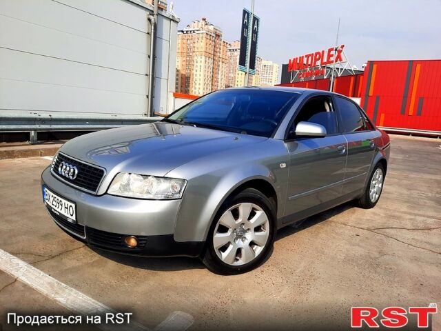 Серый Ауди А4, объемом двигателя 1.6 л и пробегом 243 тыс. км за 5850 $, фото 1 на Automoto.ua