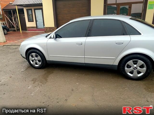Сірий Ауді А4, об'ємом двигуна 2 л та пробігом 255 тис. км за 6100 $, фото 1 на Automoto.ua