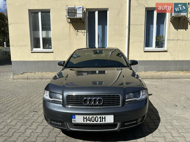 Сірий Ауді А4, об'ємом двигуна 2 л та пробігом 158 тис. км за 5400 $, фото 1 на Automoto.ua