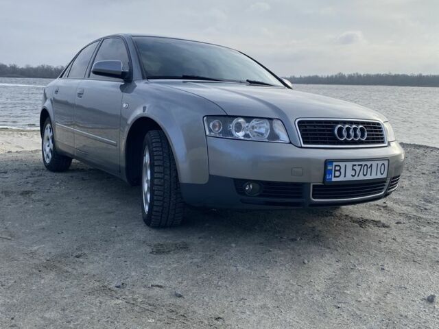 Серый Ауди А4, объемом двигателя 2 л и пробегом 221 тыс. км за 5800 $, фото 1 на Automoto.ua