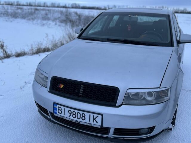 Сірий Ауді А4, об'ємом двигуна 1.8 л та пробігом 387 тис. км за 4750 $, фото 1 на Automoto.ua