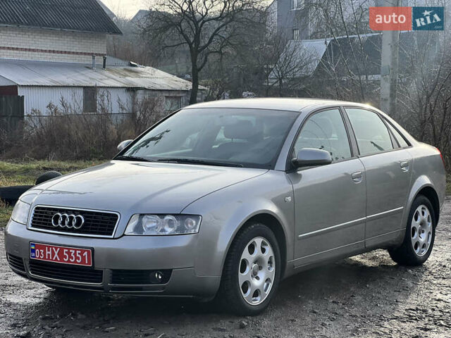 Серый Ауди А4, объемом двигателя 2 л и пробегом 221 тыс. км за 5800 $, фото 1 на Automoto.ua