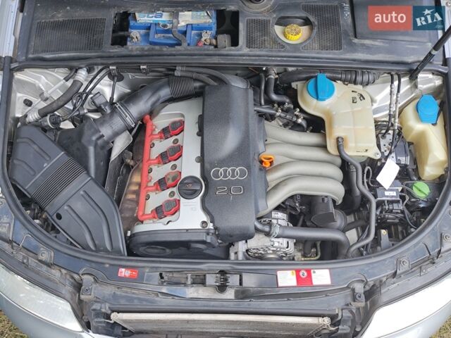 Серый Ауди А4, объемом двигателя 2 л и пробегом 214 тыс. км за 6000 $, фото 1 на Automoto.ua