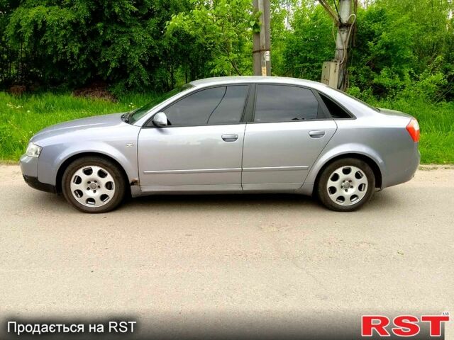 Серый Ауди А4, объемом двигателя 2 л и пробегом 200 тыс. км за 3500 $, фото 1 на Automoto.ua