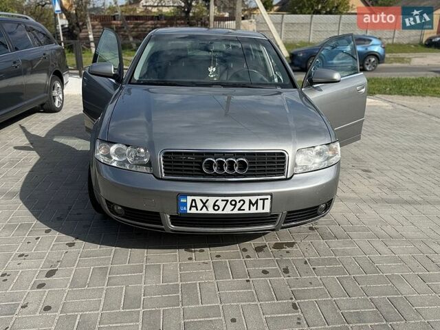 Серый Ауди А4, объемом двигателя 2 л и пробегом 301 тыс. км за 5000 $, фото 1 на Automoto.ua